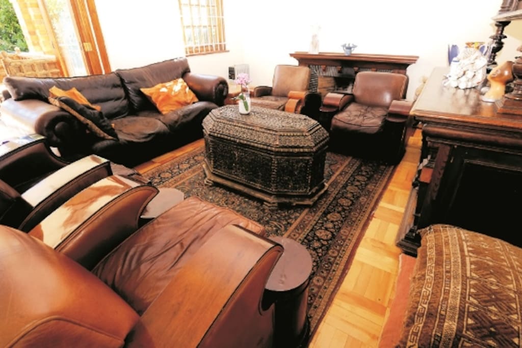 Lounge with DSTV and big large curved TV