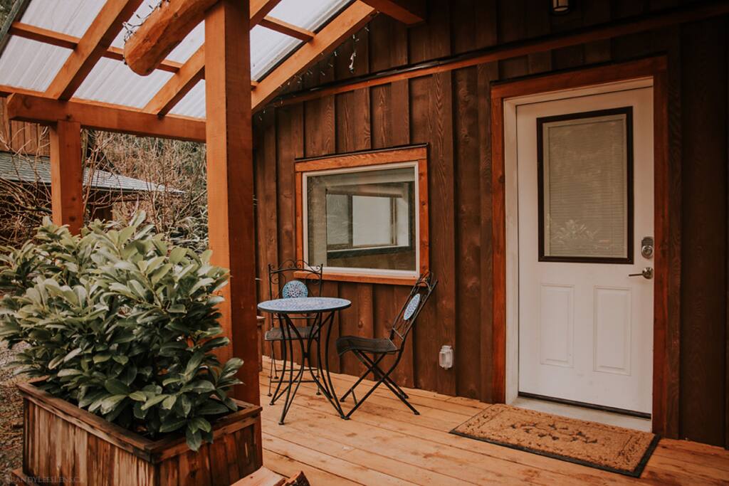 Cedar patio constructed from wood harvested on the property.