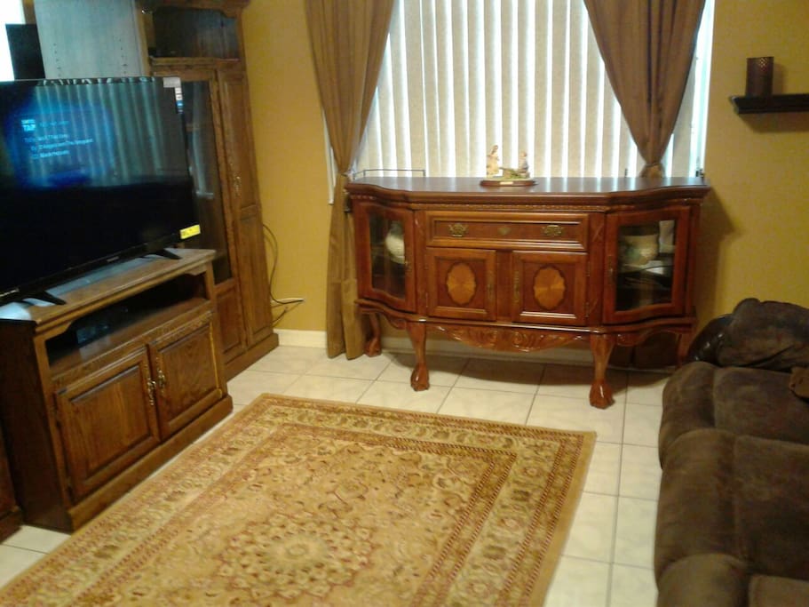 Very comfortable front room where you can relax and watch a great movie.