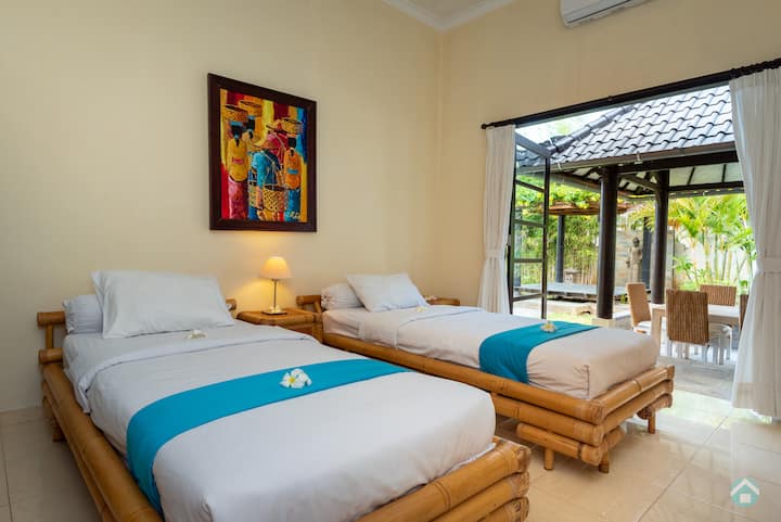 One of the four bedrooms in Villa 1