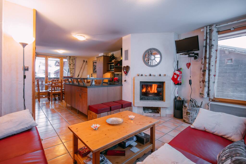 Living room.
Warm fireplace.
Kitchen and dining room at back side