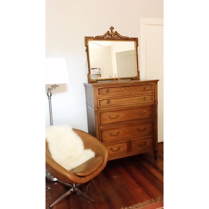 Private bedroom with closet and dresser