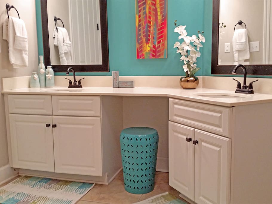 Master Bathroom with Stand alone shower and jacuzzi tub.