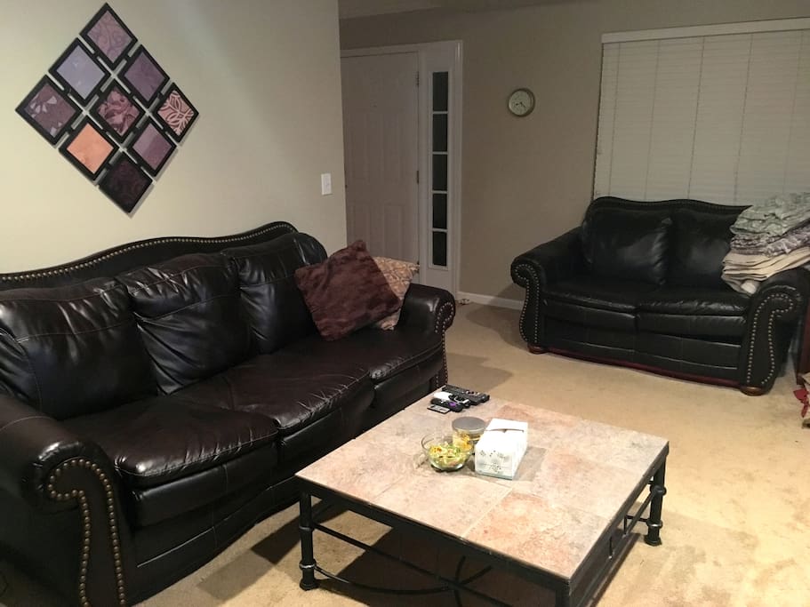 Comfortable living area for relaxing after being out enjoying Nashville! Wifi, TV, DVD player, Roku & much more.
