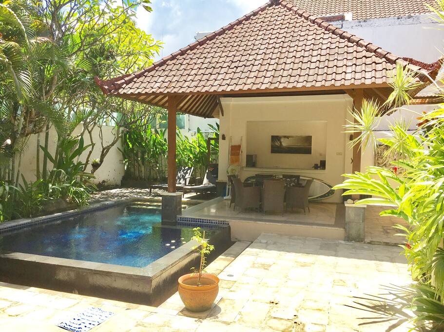 Outdoor bar, seating area and pool