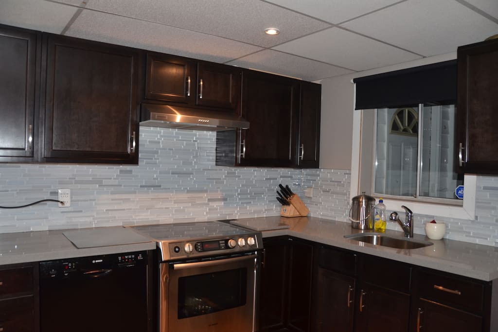 Newly renovated kitchen with dishwasher.