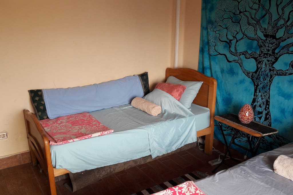 The other bed in the 2 twin bed guestroom with balcony overlooking the Nile