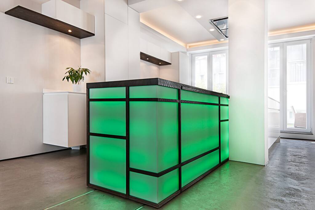 The bar lights up and either extend the kitchen countertop...