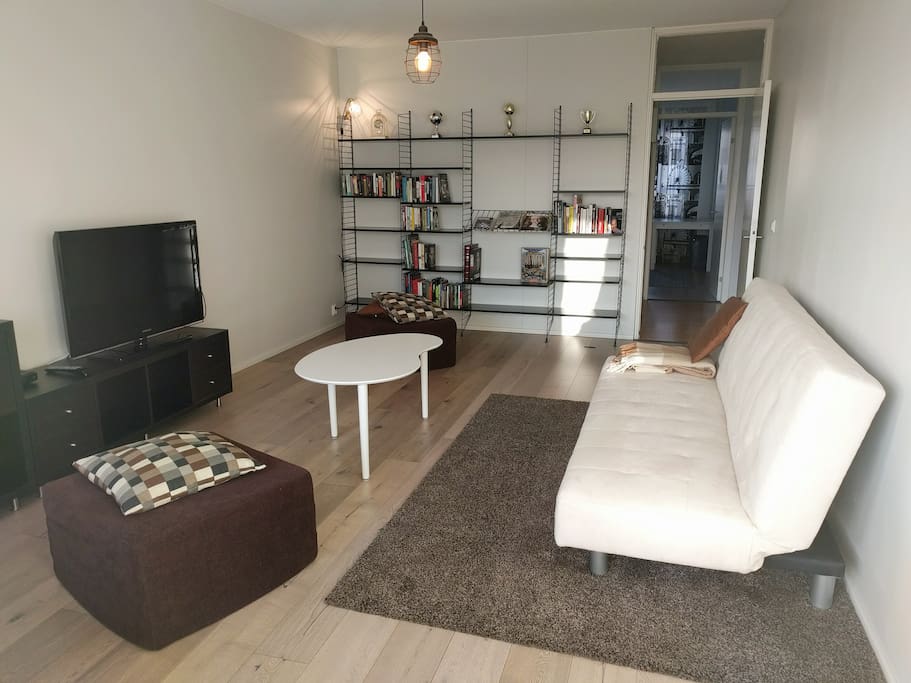 Living room. "Very good wifi, big appartment spacious for 4 people, nice furniture and decoration." (Guest)