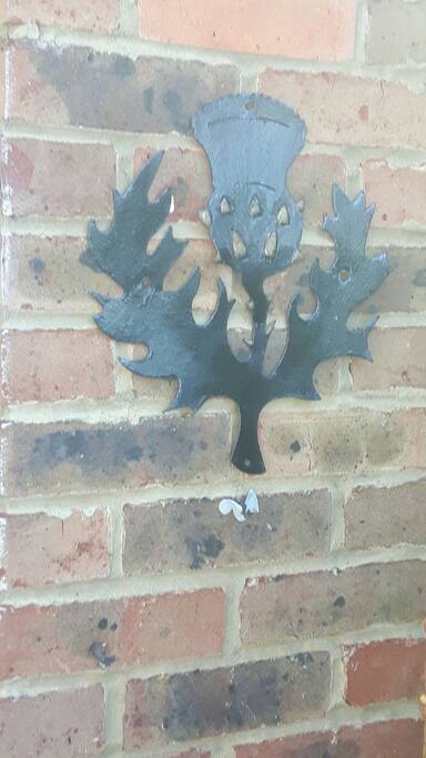 The symbol for Thistle Croft Apartment