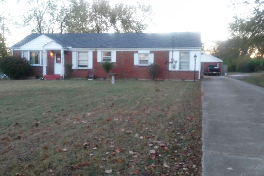 A cottage home on 1 acre of land close to the city.