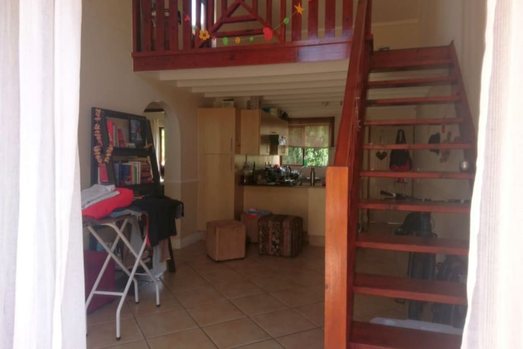 The common area and stairs to the deck