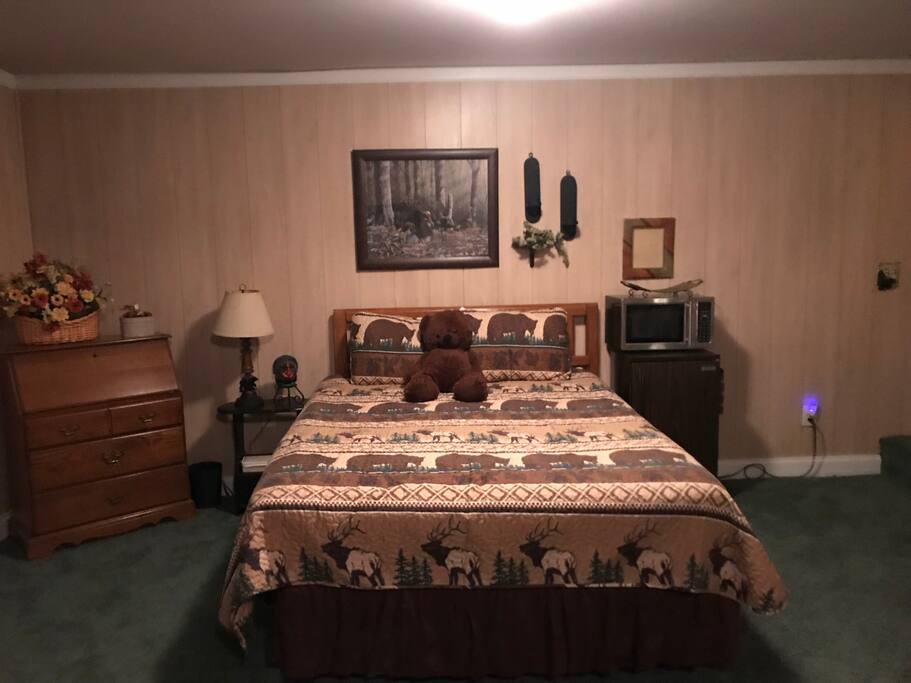 First queen bed in common area.
Refrigerator, microwave, coffee marker in this area. Coffee, tea bags, creamer, sugar, cups, provided.