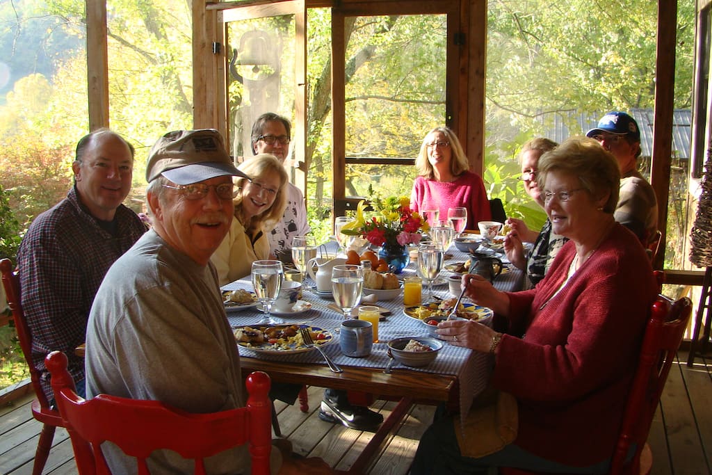 We serve breakfast, lunch and dinner on our screened in porch in spring and in front of the fire in the winter.