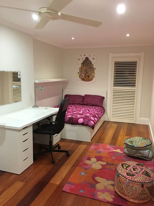 Large bedroom with desk