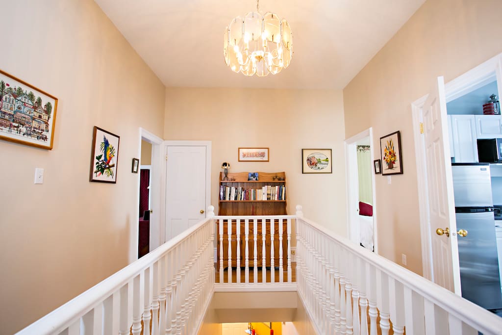 This historical home has very high ceilings and wood floors. All upstairs rooms are accessible from the spacious wrap around hall.