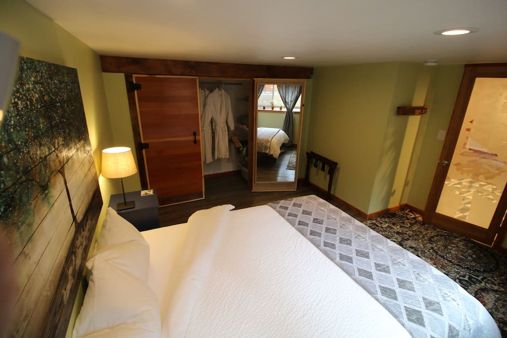 Master suite with comfortable queen-sized mattress. Closet is always stocked with additional pillows for all firmness levels, additional cozy blankets, and additional linens.