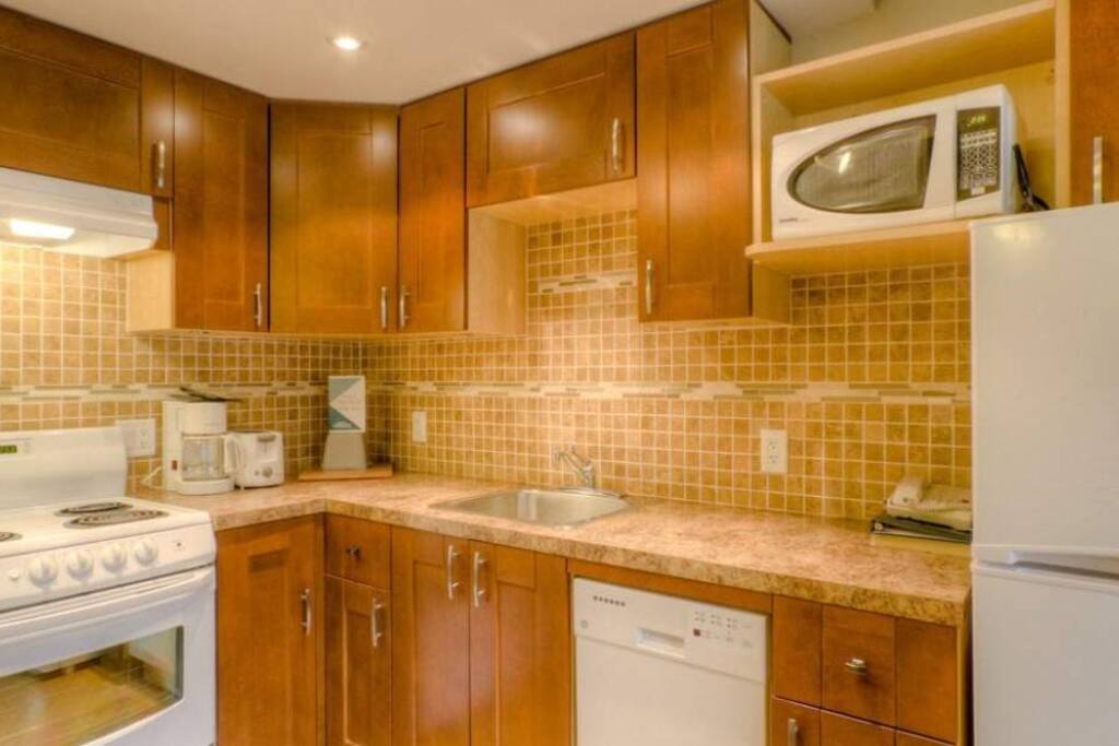 The kitchen is fully equipped for cooking