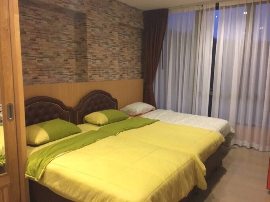 Twin Beds with extra bed.