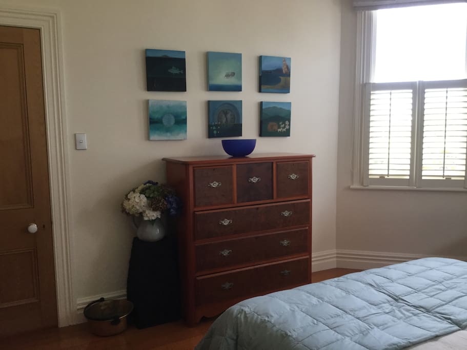 Original artworks and antique scotch dresser.