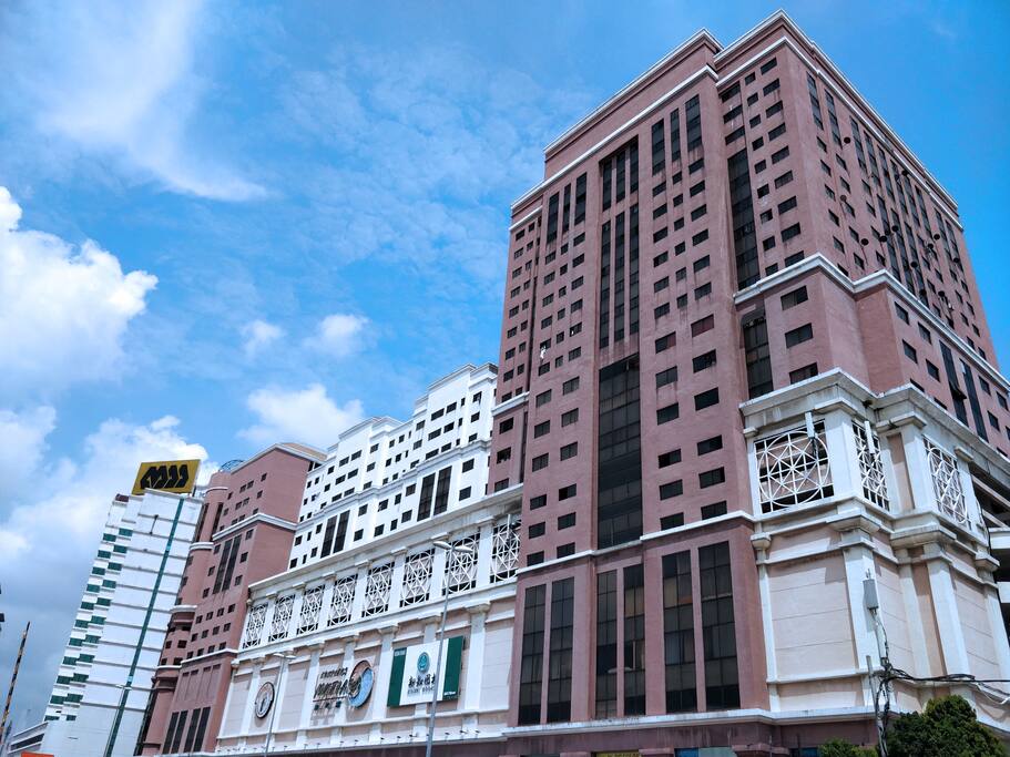 Outside view of Apt building/ Shopping complex
