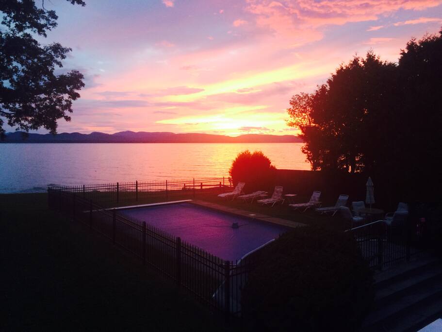 Sunset over pool and lake