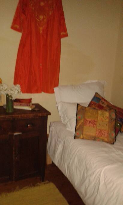 This is a cozy room conveniently nearer the bathroom and communal area of the house, gets the morning sunlight and is equipped for your basic needs. It gets set up in a Masculine or Feminine style depending on the gender of the guest booking.