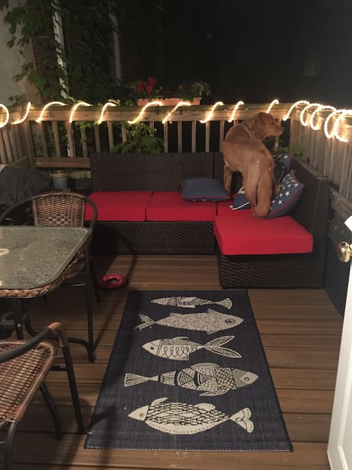 Deck with new outdoor couch and table for enjoying nice days and nights