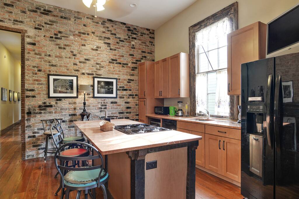 Fully stocked, modern kitchen.