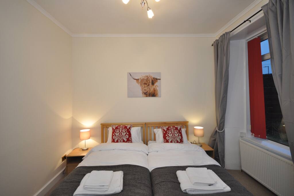 Twin bedroom with two single beds.