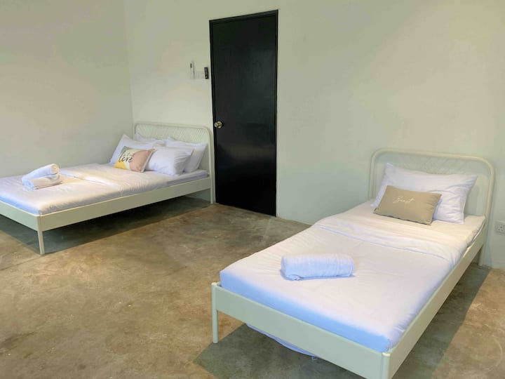 Room 2 comes with 1 single bed & 1 double bed
