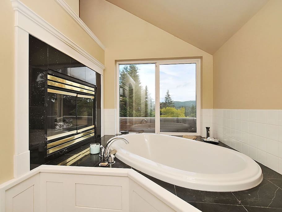 Soaker Tub in Master Bathroom, private on suite bathroom with Shower as well. Two way fire place, lay in bed and watch the fire.