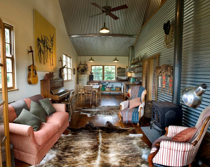 Charming main lounge kitchen with wood fire