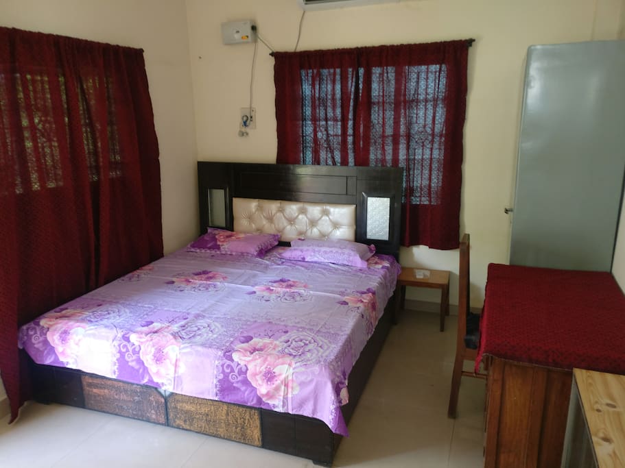 Double bed with attached bathroom