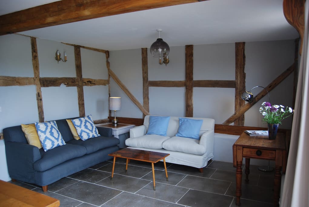 Stylish open plan living space, limestone floors and underfloor heating.