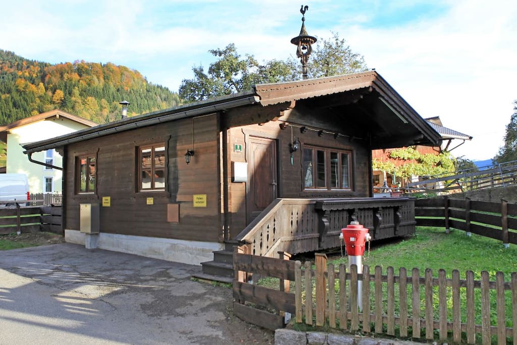 The apartment from outside. A parking space is available to the side of the building.