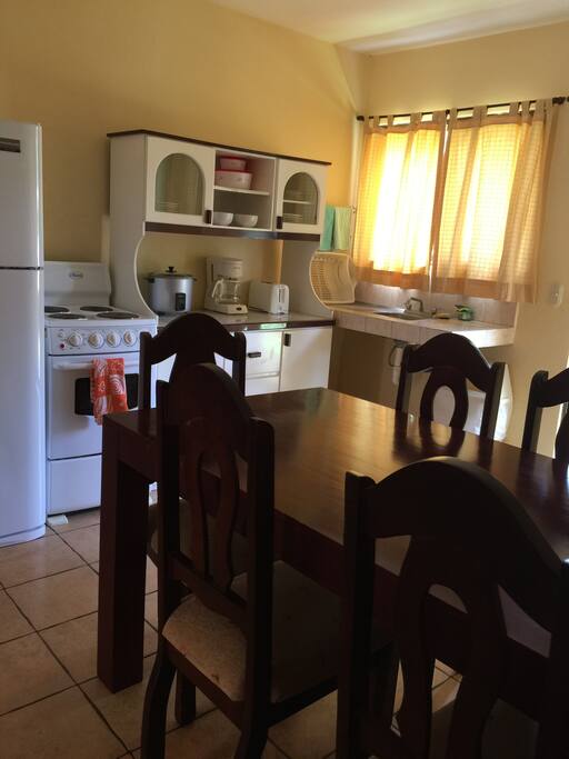 Photo of the kitchen and dining area.