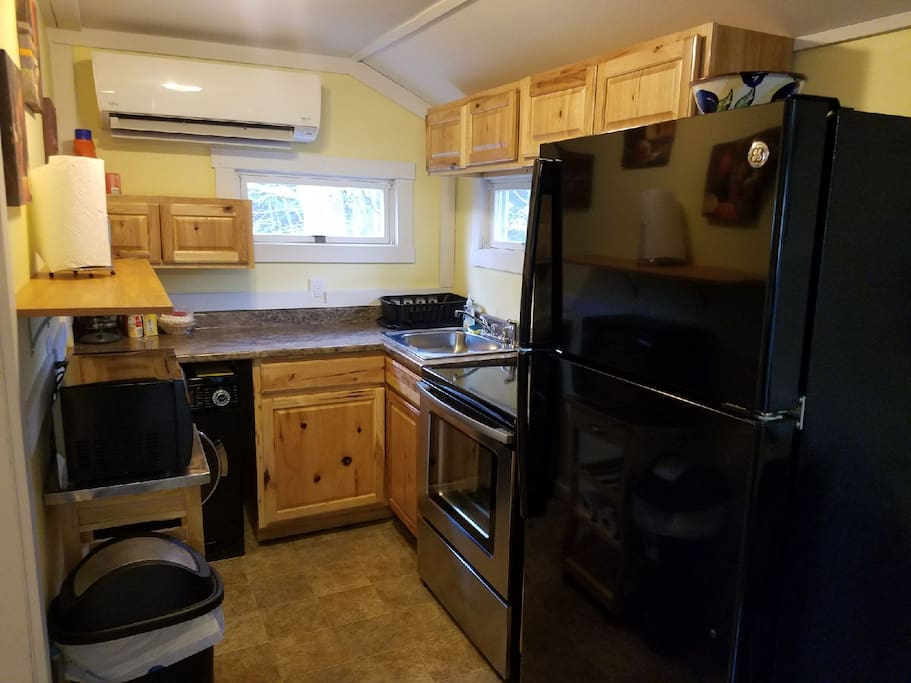 Kitchen with Dishes, pots and pans