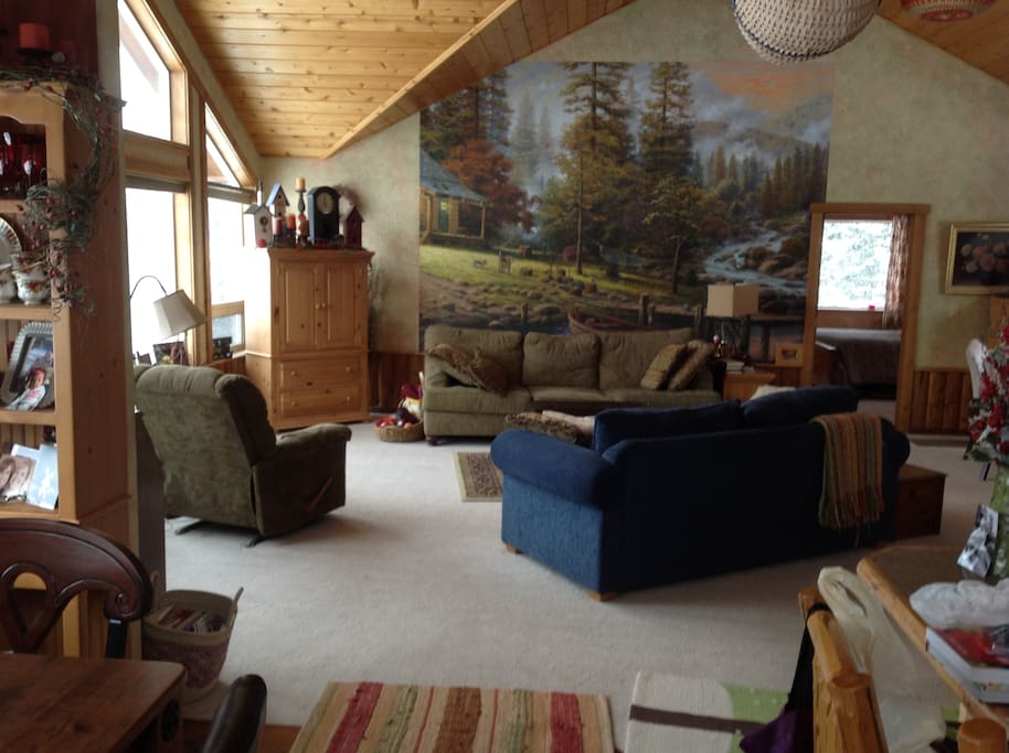 This truly is called, The Great Room! It has a beautiful Thomas Kincade wall mural that compliments the house setting!