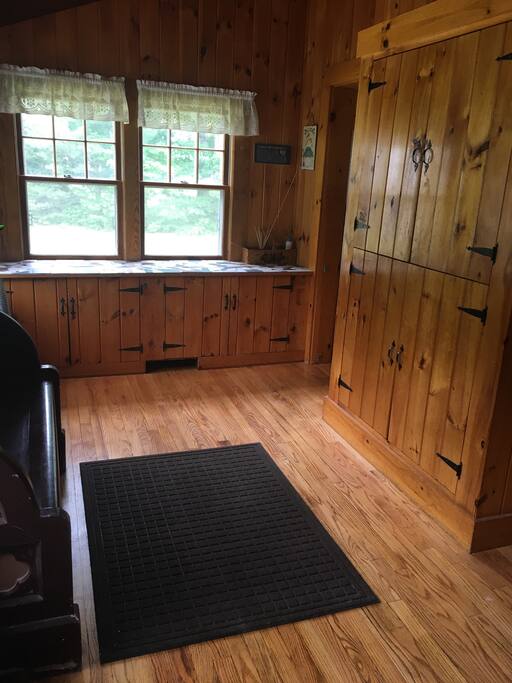 Foyer with built in pantry