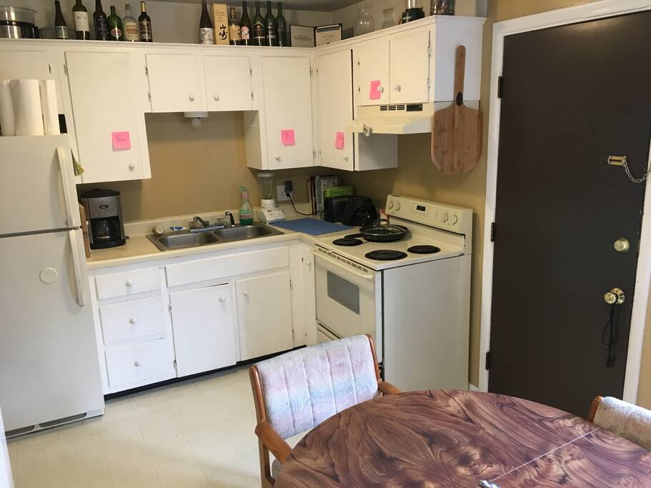 Kitchen, stocked with coffee, hot chocolate, pancake mix, tea, oatmeal, snacks, and other staples