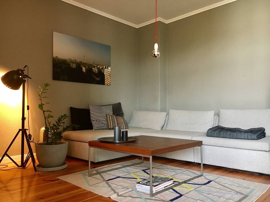 Living room with TV, music box, couch and dining table #2