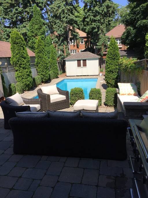 Large pool with comfortable patio seating