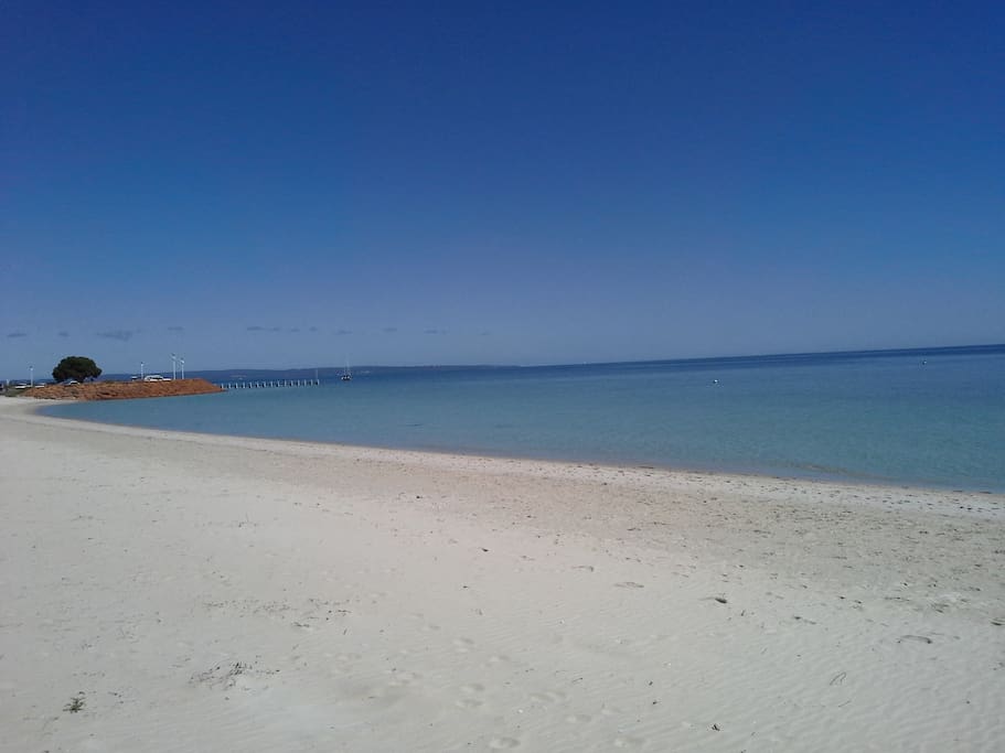 The beach in front of the home