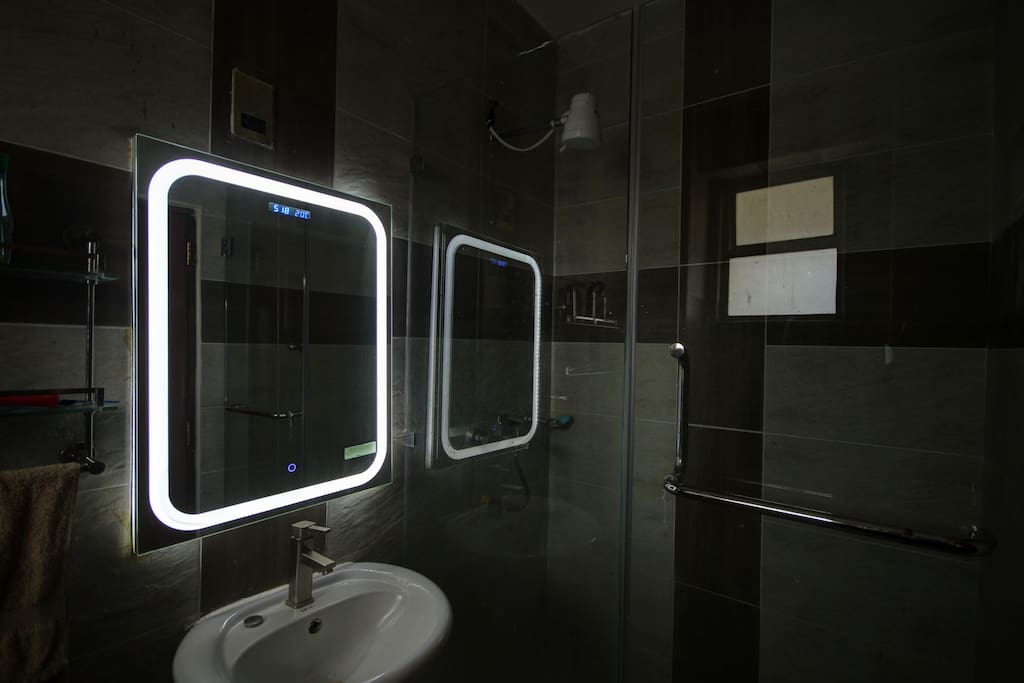 Bathroom shower head hot water, glass doors led mirror light. Experience beauty.
