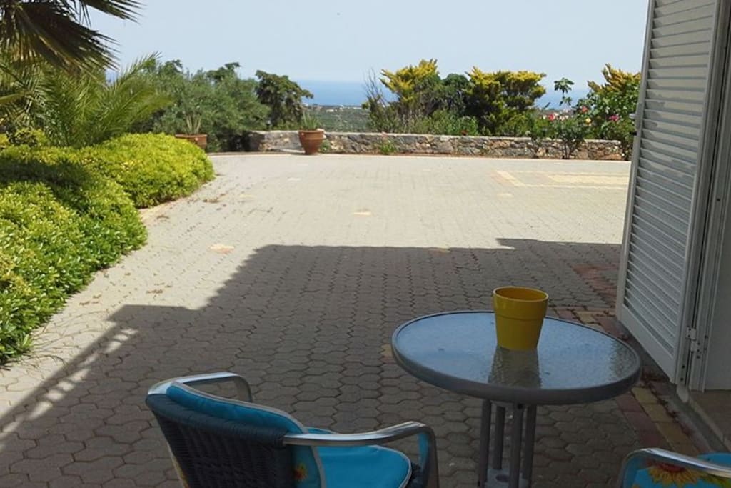 The outdoor patios are lovely day or night. View of the sea!