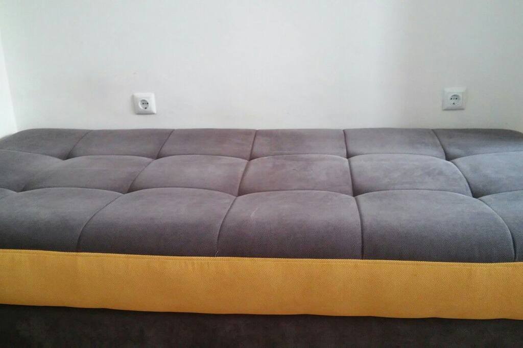 The couch can be made into a comfy bed to crash on