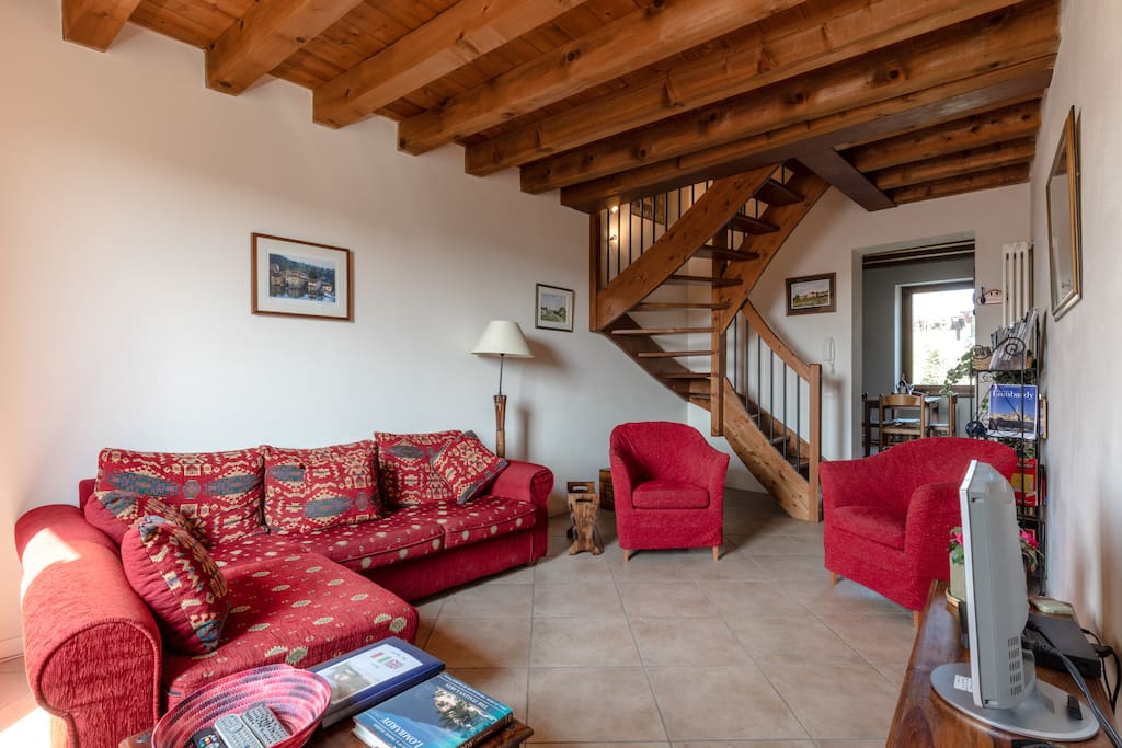 Living room with stairs to the 2nd floor