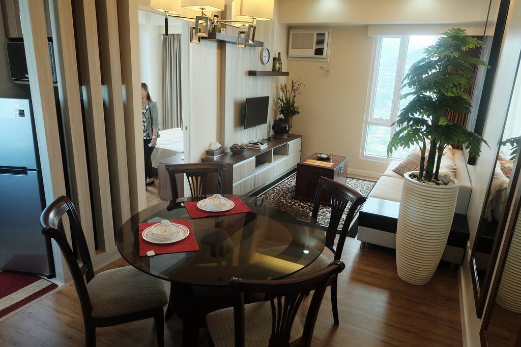 Dining Area, Living Area, A portion of the Kitchen and Room (view from the main door)