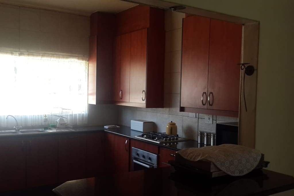 Kitchen with Gas stove & Microwave oven
